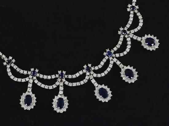 A 1980s Italian 18ct white gold, sapphire and diamond set drop necklace by Cuccarollo Costante, Vicenza, 43cm.